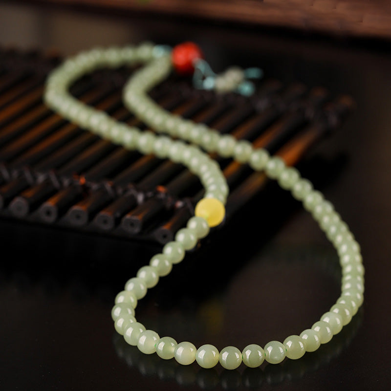 Bracelet de prospérité Bouddha rieur en jade agate rouge et ambre