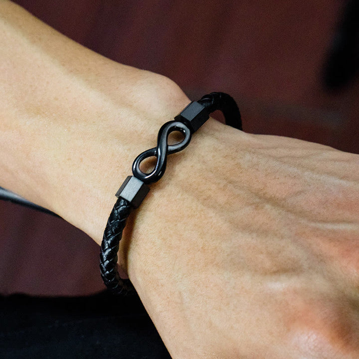Bracelet d'équilibre en cuir tissé avec nœud sans fin en acier titane et Buddha Stones