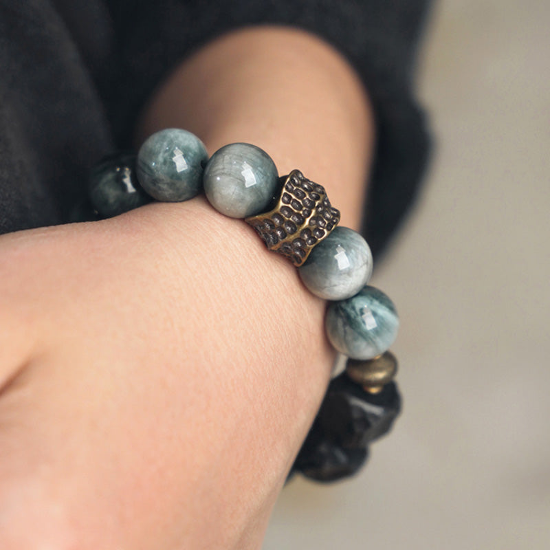 Bracelet de couple en cuivre et bois d'ébène avec pierre œil d'aigle et Buddha Stones