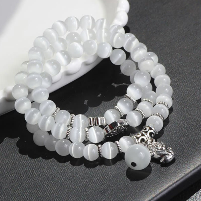 Bracelet triple tour de soutien PiXiu œil de chat en Buddha Stones