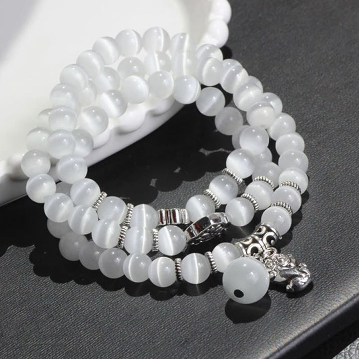 Bracelet triple tour de soutien PiXiu œil de chat en Buddha Stones