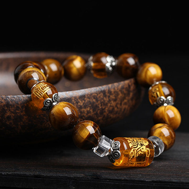 Bracelet de prospérité en perles d'œil de tigre et Buddha Stones