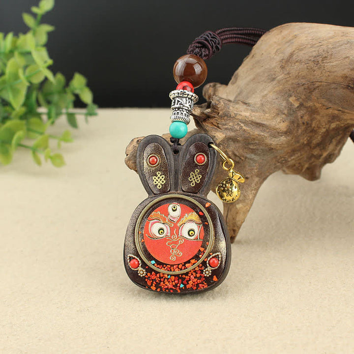 Collier pendentif Thangka en ébène du Tibet représentant les cinq dieux de la richesse