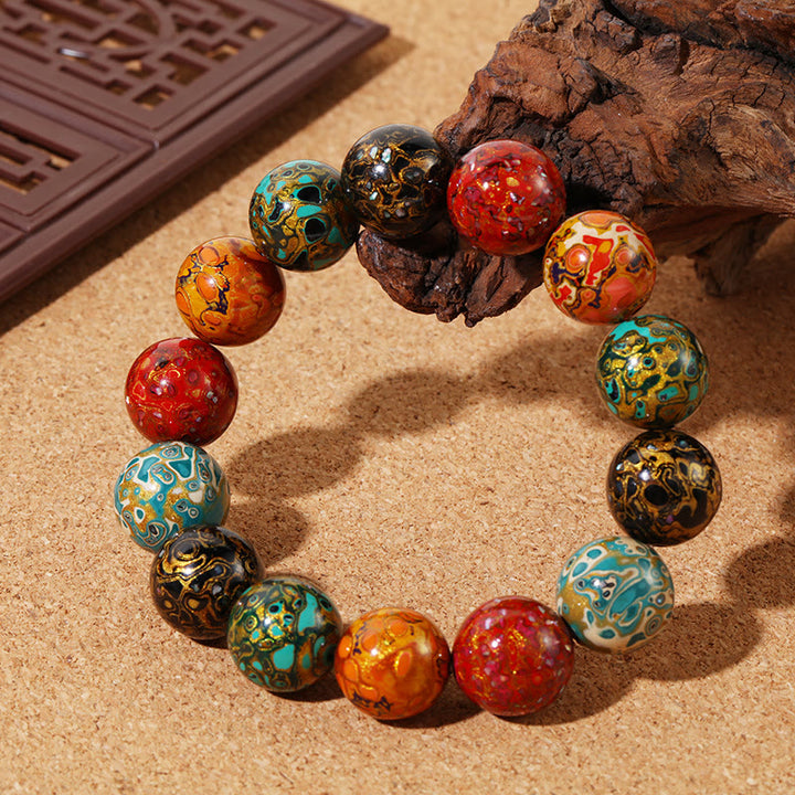 Bracelet calme en perles de laque multicolores naturelles Buddha Stones