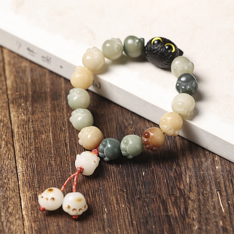 Bracelet de sagesse porte-bonheur en bois d'ébène avec de belles pattes et des graines de Bodhi naturelles de Buddha Stones - image 10