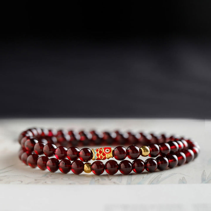 Bracelet de protection en grenat naturel avec poisson koï en or 999 de Buddha Stones - Bracelet double tour en grenat et or avec motif de carpes koï (5 mm). - 17 cm - image 12