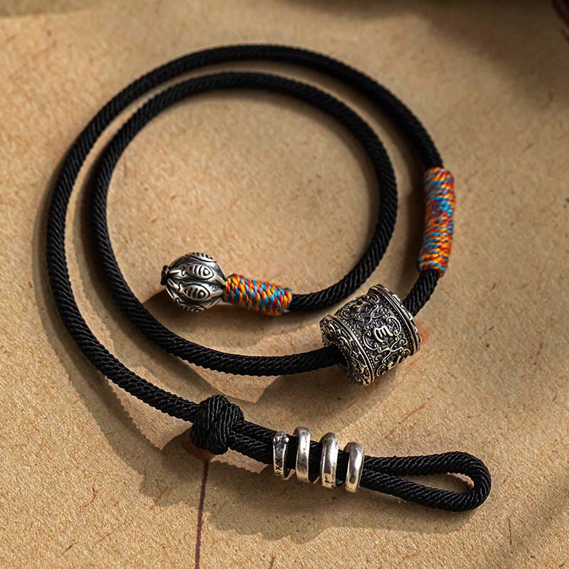Bracelet double tour en amulette sculptée tibétain avec Buddha Stones Om Mani Padme Hum