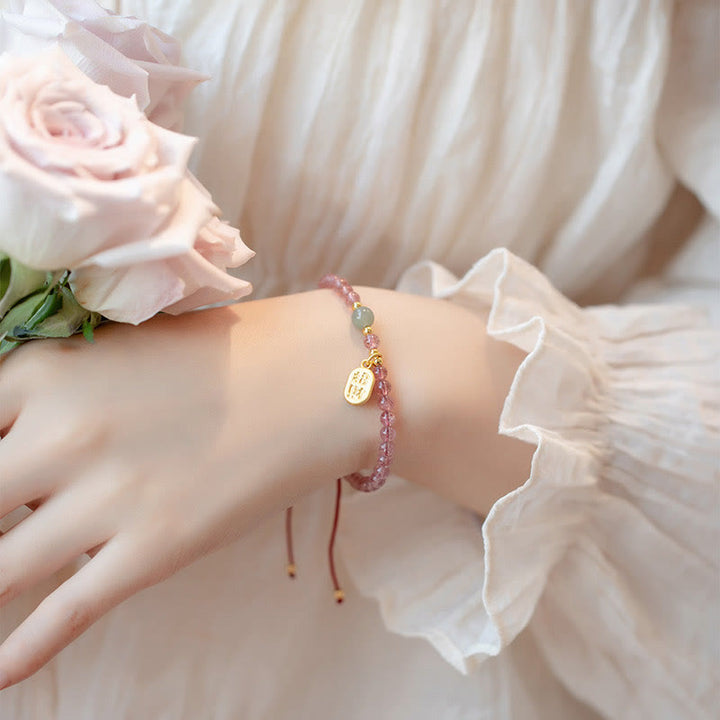 Bracelet porte-bonheur en Buddha Stones, quartz fraise, grenat, jade, caractère Fu