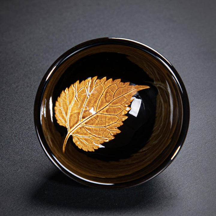 Tasse à thé en céramique chinoise Jianzhan avec feuilles d'érable dorées et Buddha Stones