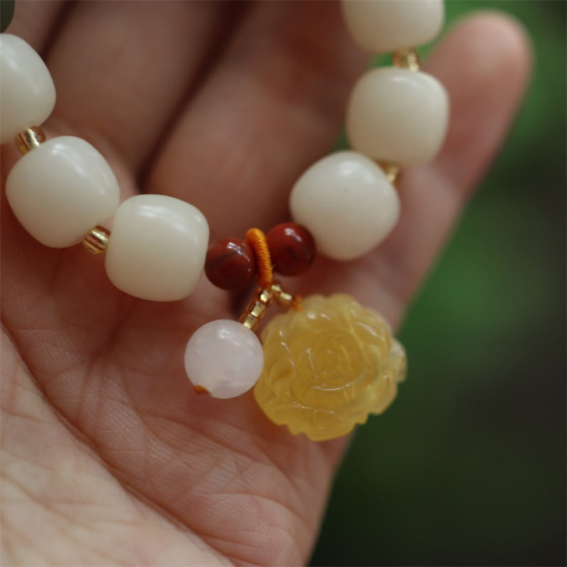 Bracelet de paix en ambre et graines de Bodhi avec Buddha Stones dégradées