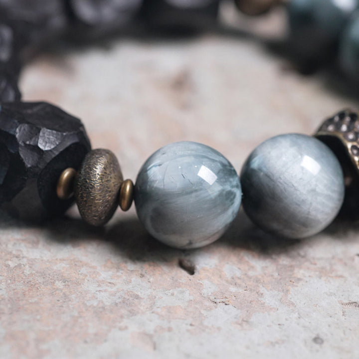 Bracelet de couple en cuivre et bois d'ébène avec pierre œil d'aigle et Buddha Stones