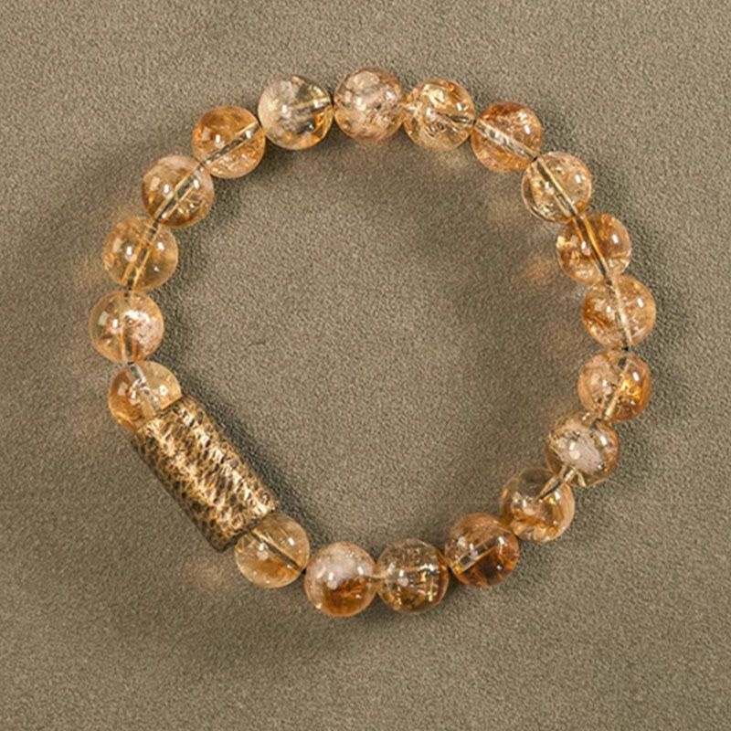 Bracelet de protection en perles de cristal de citrine naturelle et de laiton Buddha Stones