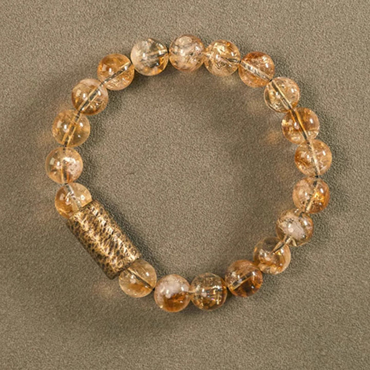 Bracelet de protection en perles de cristal de citrine naturelle et de laiton Buddha Stones