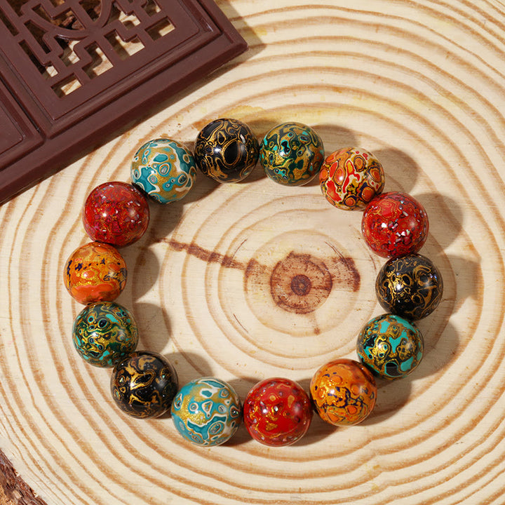 Bracelet calme en perles de laque multicolores naturelles Buddha Stones