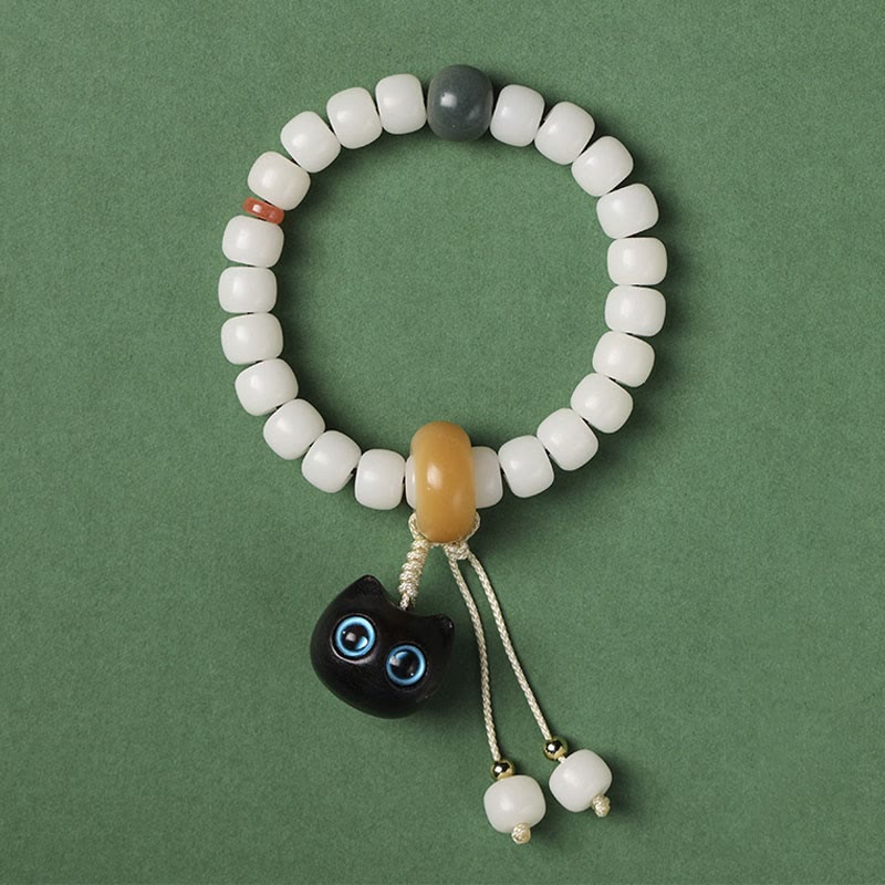 Bracelet en Buddha Stones en graines de Bodhi naturelles en bois noir africain avec joli chat et breloque pour la paix et l'harmonie - Graine de Bodhi du chat aux yeux bleus - image 6