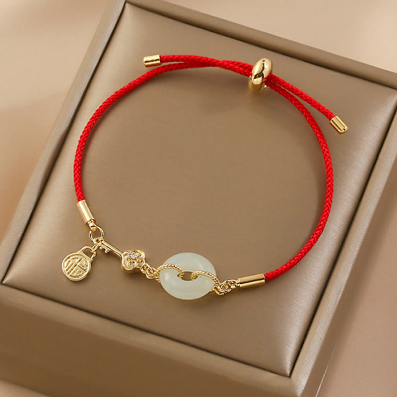 Bracelet en corde rouge avec boucle de paix en jade Hetian plaqué or 18 carats et Buddha Stones