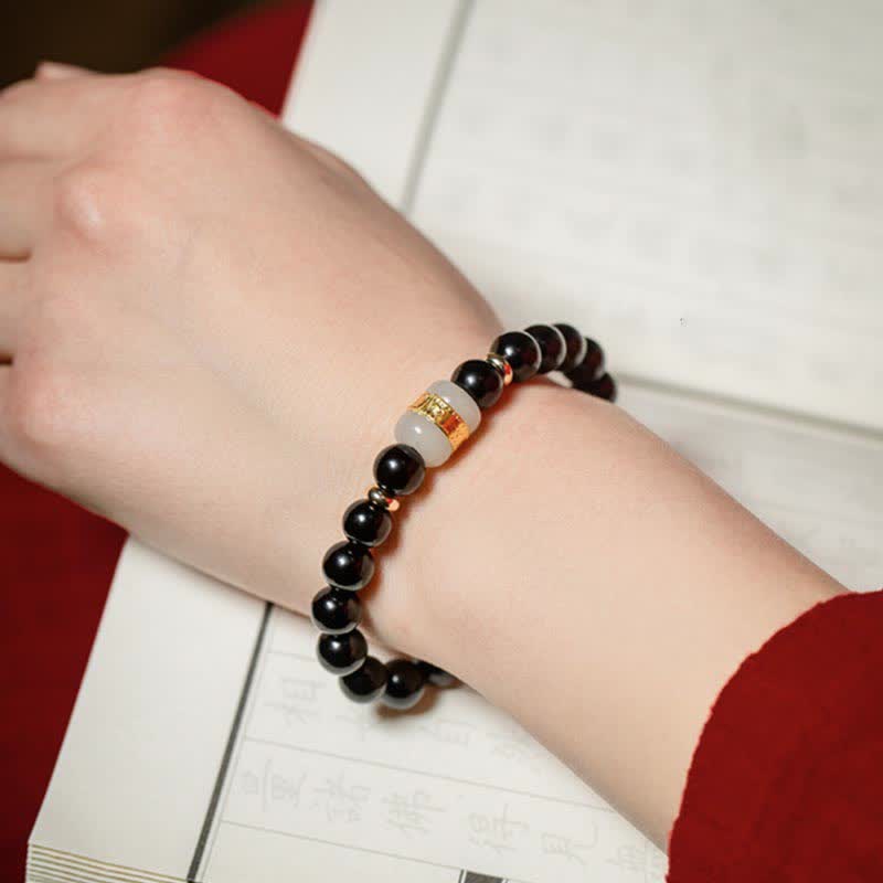 Bracelet magnétique pour couple en obsidienne Buddha Stones et jade Om Mani Padme Hum