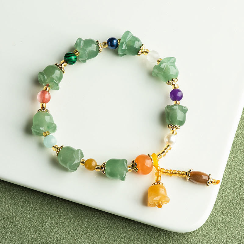 Bracelet porte-bonheur en aventurine verte et fleur de magnolia de Buddha Stones