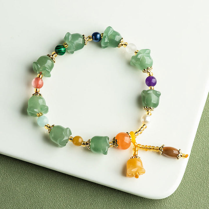Bracelet porte-bonheur en aventurine verte et fleur de magnolia de Buddha Stones