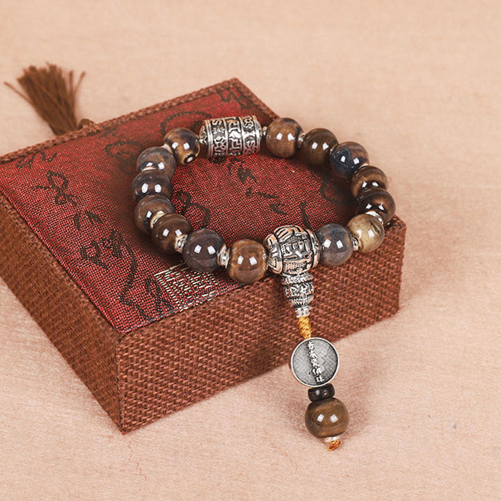Bracelet de sagesse en perles de verre gravées Buddha Stones et roue de prières tibétaines Om Mani Padme Hum Dorje Vajra
