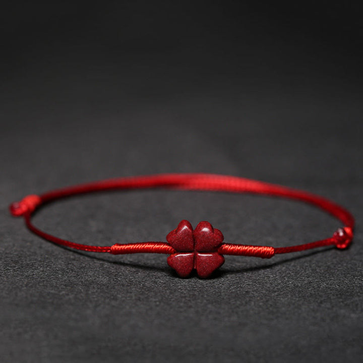 Bracelet tressé fait main en Buddha Stones avec fleur de prunier et trèfle à quatre feuilles PiXiu Lotus Koi Fish Cinabre Blessing