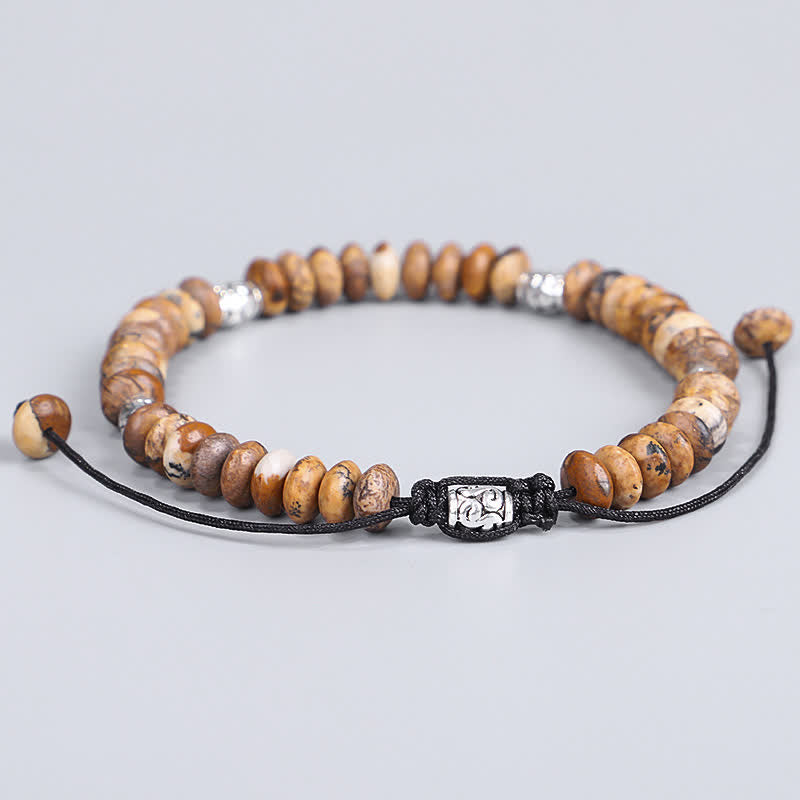 Bracelet en fil de perles positives en jaspe photo