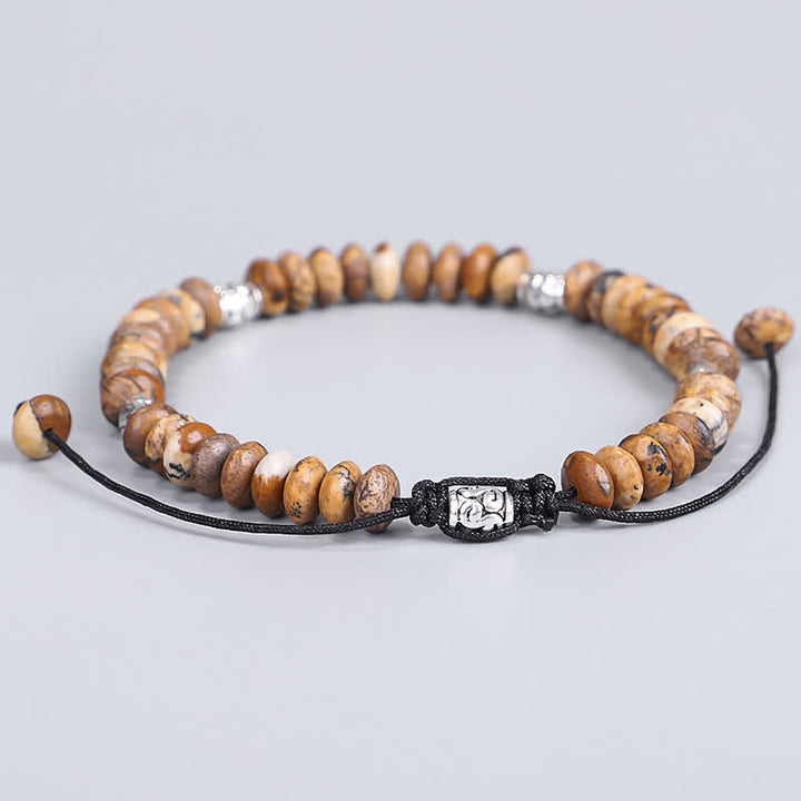 Bracelet en fil de perles positives en jaspe photo