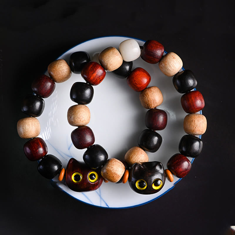 Bracelet de protection gravé en bois de santal rouge et ébène avec petites feuilles de Buddha Stones et chat mignon - image 2