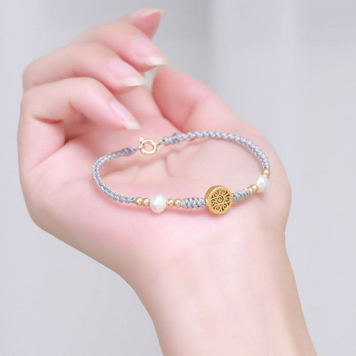 Bracelet tressé en corde bleue avec perles et arbre de fortune en cuivre et Buddha Stones