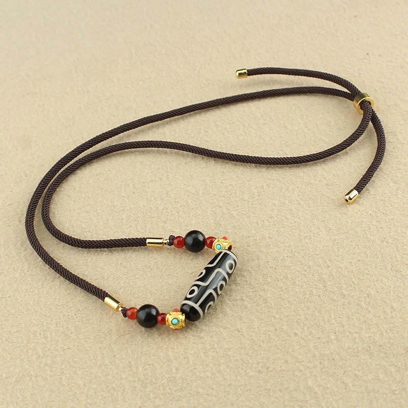 Collier pendentif en corde avec Buddha Stones