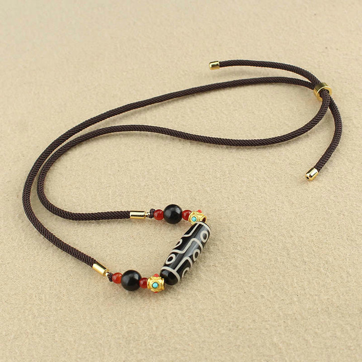 Collier pendentif en corde avec Buddha Stones