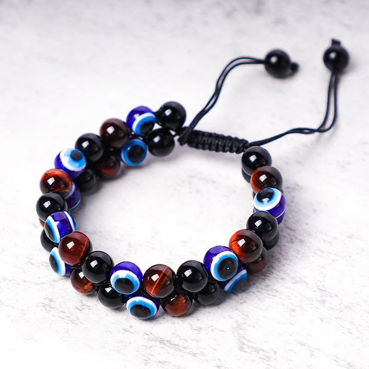 Bracelet de perles de protection contre le mauvais œil en hématite et œil de tigre Buddha Stones