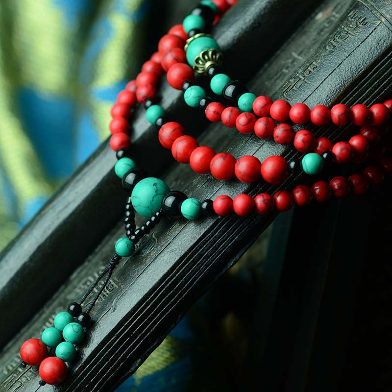 Bracelet de protection en perles de turquoise rouge et onyx noir Buddha Stones