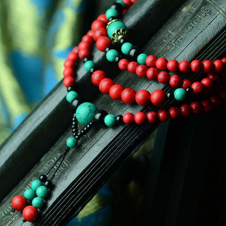 Bracelet de protection en perles de turquoise rouge et onyx noir Buddha Stones
