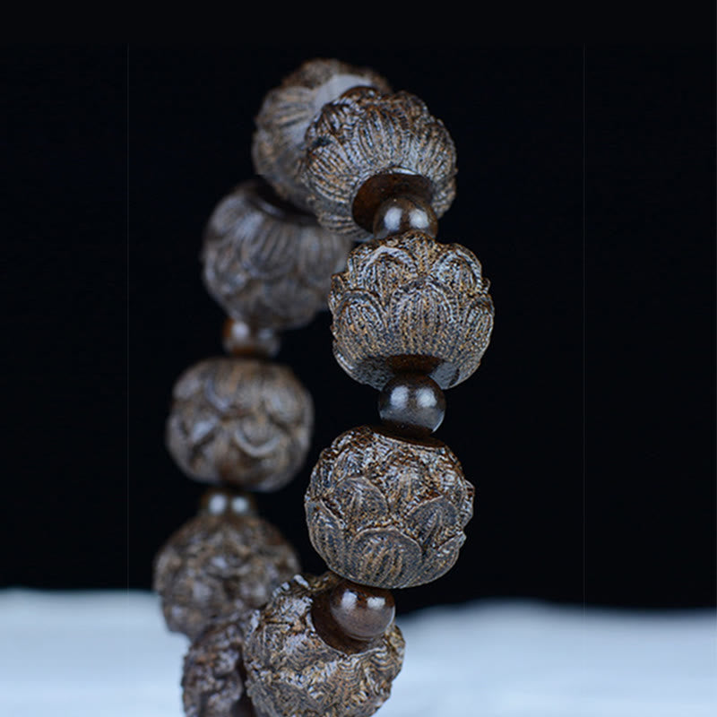 Bracelet d'équilibre gravé en bois d'ébène avec Buddha Stones et dragon de lotus des dix-huit arhats