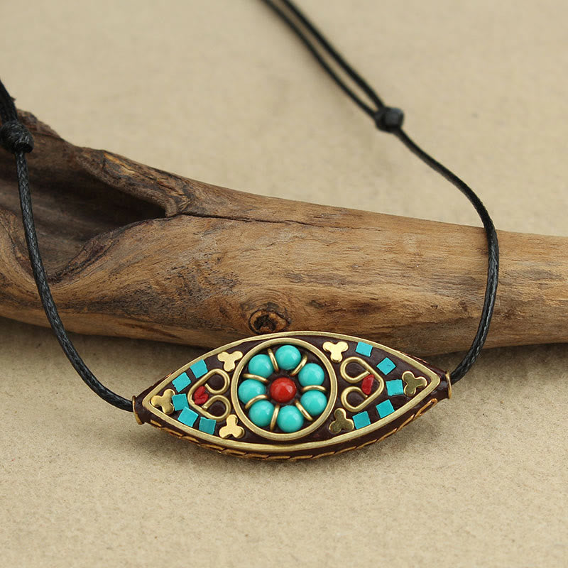 Collier pendentif en perles turquoises du Tibet avec Buddha Stones et motif marquise, protection et force