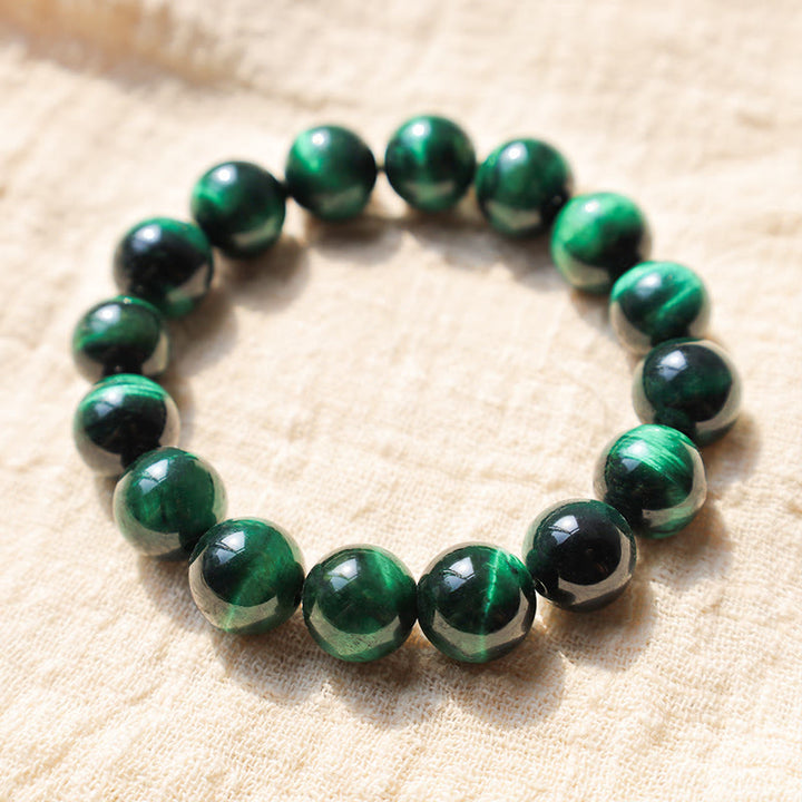 Bracelet énergétique de guérison et de croissance en œil de tigre Buddha Stones