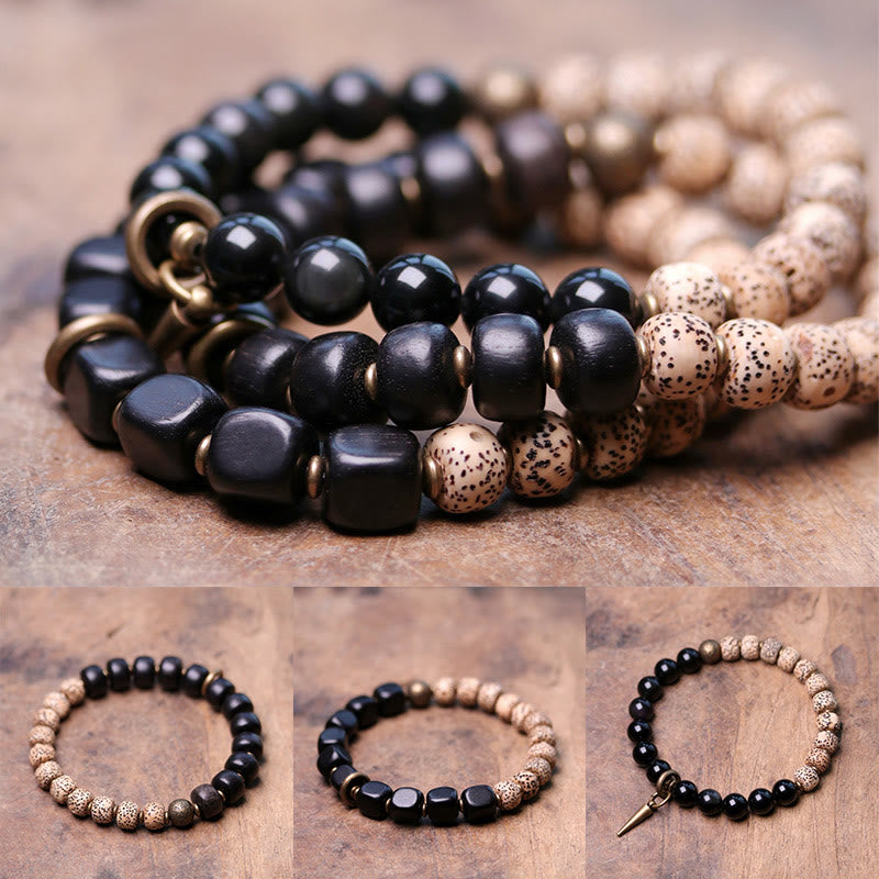 Bracelet de paix en cuivre et bois d'ébène avec Buddha Stones et graines de Bodhi tibétaines
