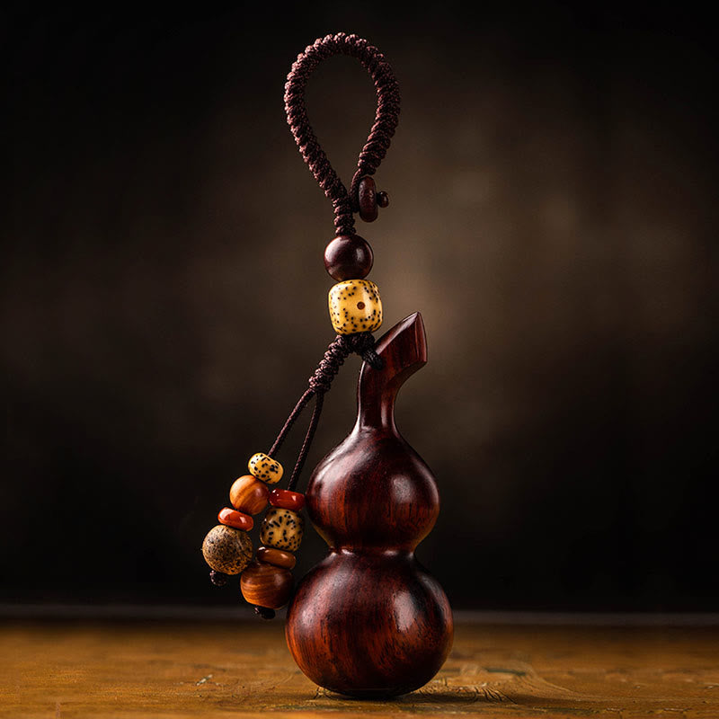Porte-clés porte-bonheur en ébène tibétain à petites feuilles de gourde en bois de santal rouge