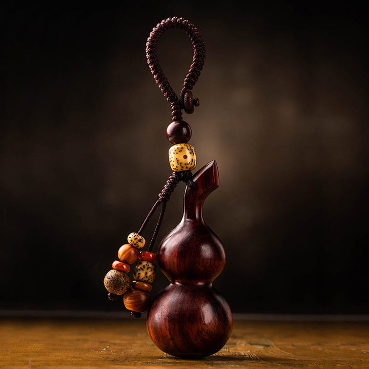 Porte-clés porte-bonheur en ébène tibétain à petites feuilles de gourde en bois de santal rouge