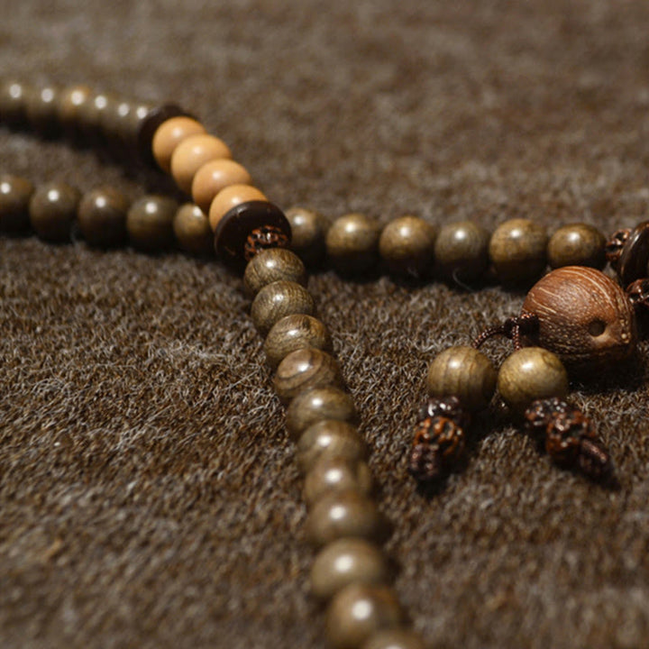 Bracelet Mala avec breloque de protection en bois de santal tibétain et Buddha Stones
