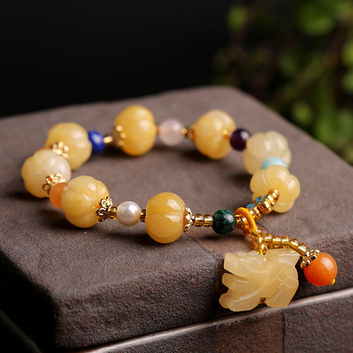 Bracelet de richesse Pixiu en jade et soie dorée avec Buddha Stones