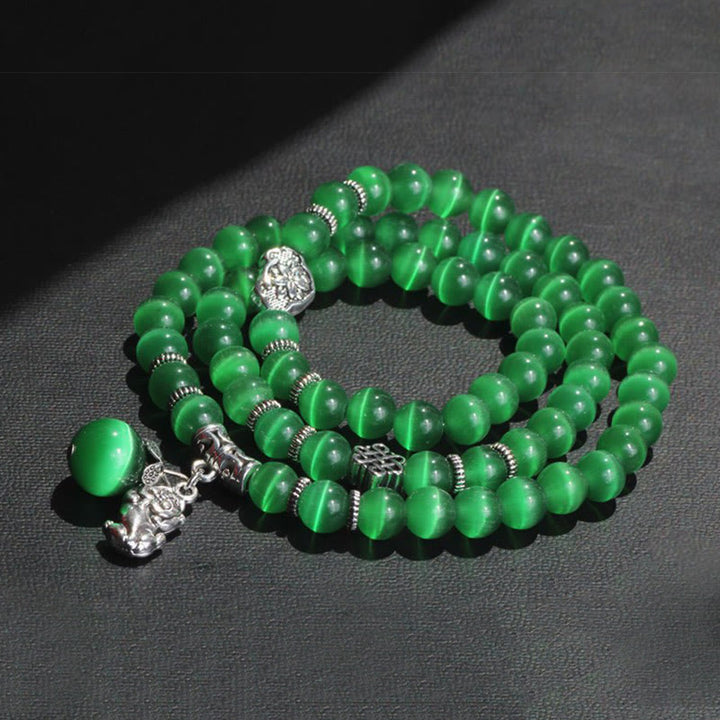 Bracelet triple tour de soutien PiXiu œil de chat en Buddha Stones
