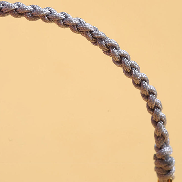 Bracelet tressé en corde bleue avec perles et arbre de fortune en cuivre et Buddha Stones
