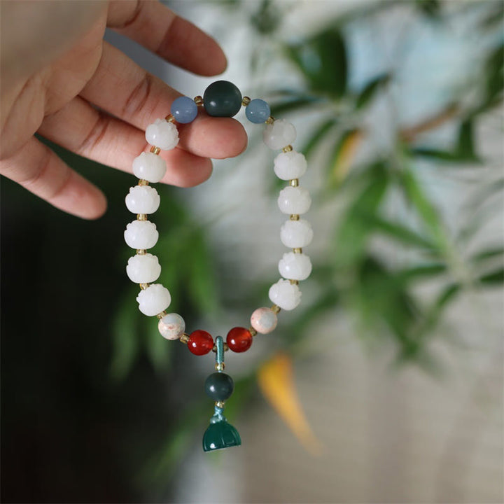 Bracelet de paix et d'harmonie sculpté en perles de lotus et graines de Bodhi en Buddha Stones