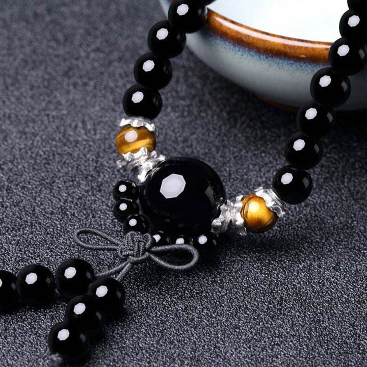 Bracelet Mala 108 perles en obsidienne noire naturelle œil de tigre Buddha Stones