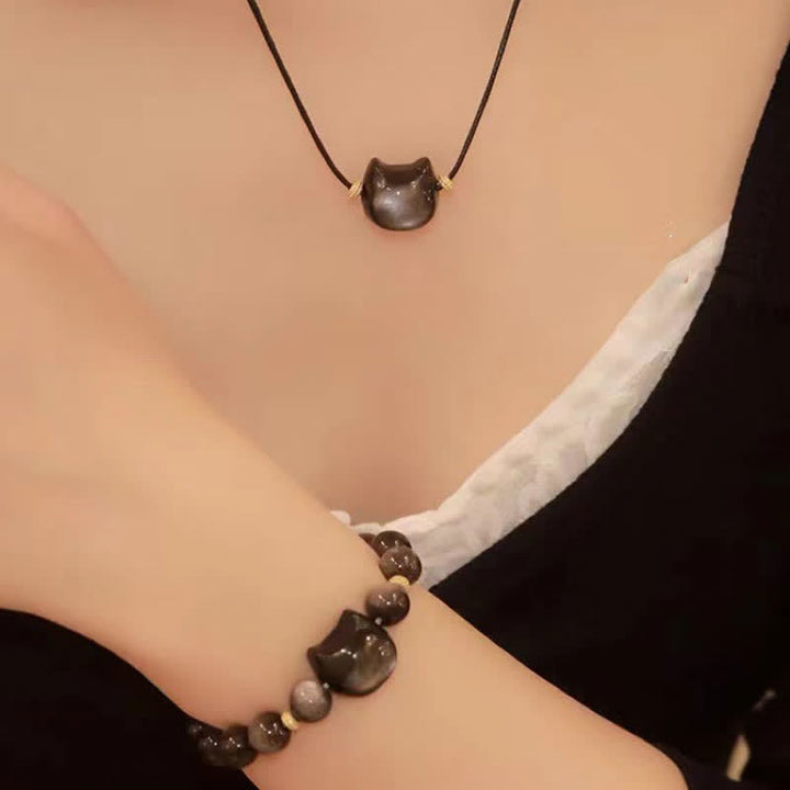 Bracelet de protection porte-bonheur en obsidienne dorée et argentée avec Buddha Stones et jolie patte de chat porte-bonheur - image 40