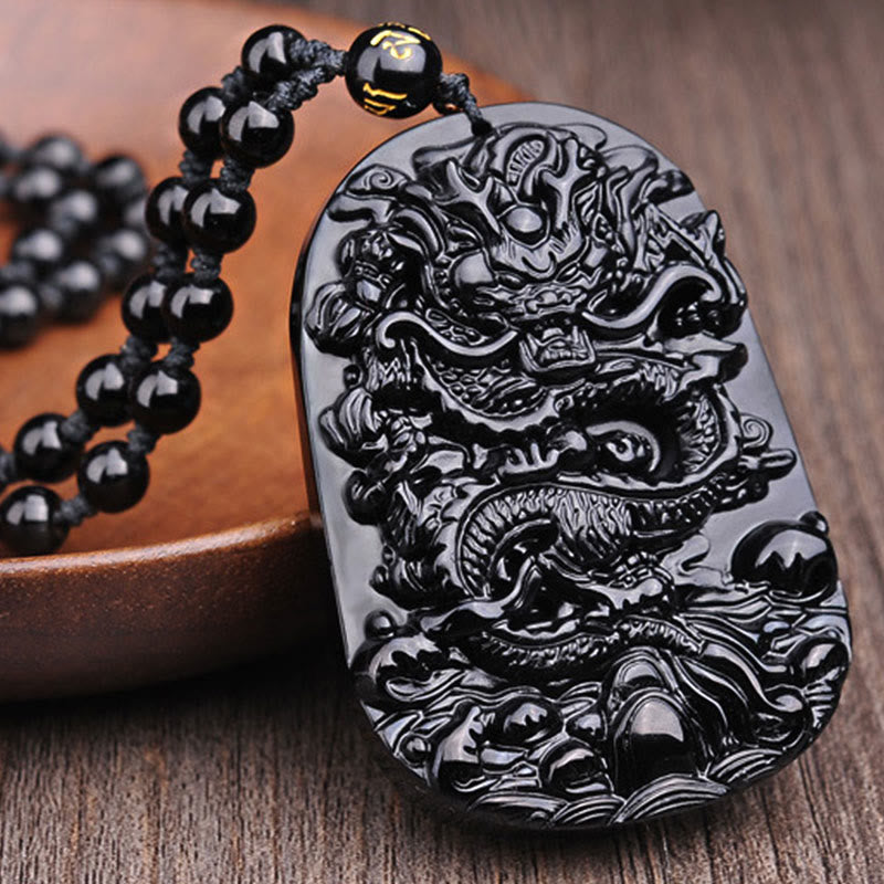 Collier avec pendentif en obsidienne noire représentant un dragon accompli et des Buddha Stones - image 6