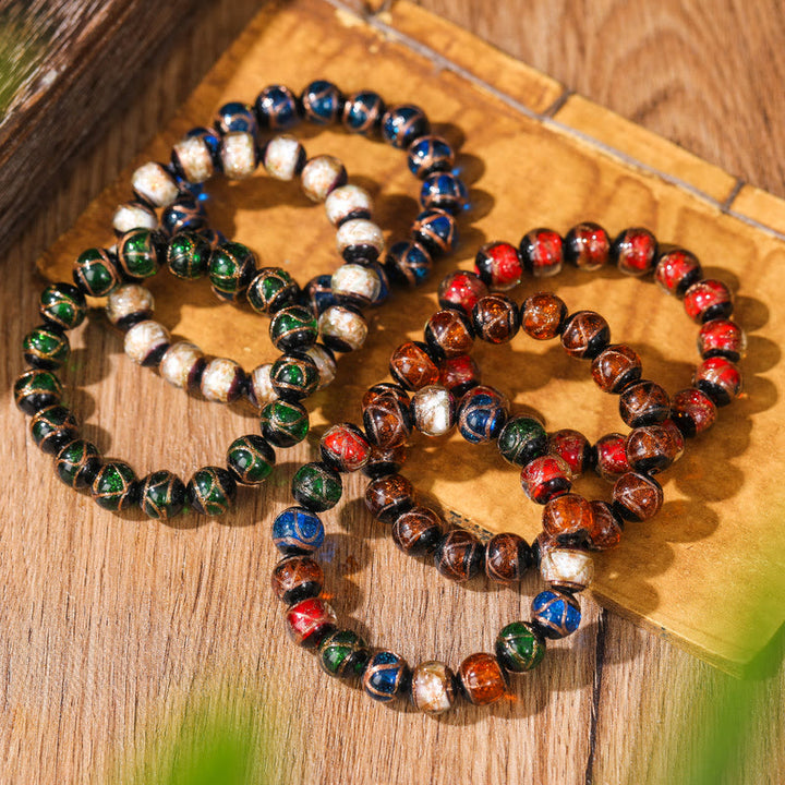 Bracelet tibétain classique en perles de verre Liuli avec Buddha Stones