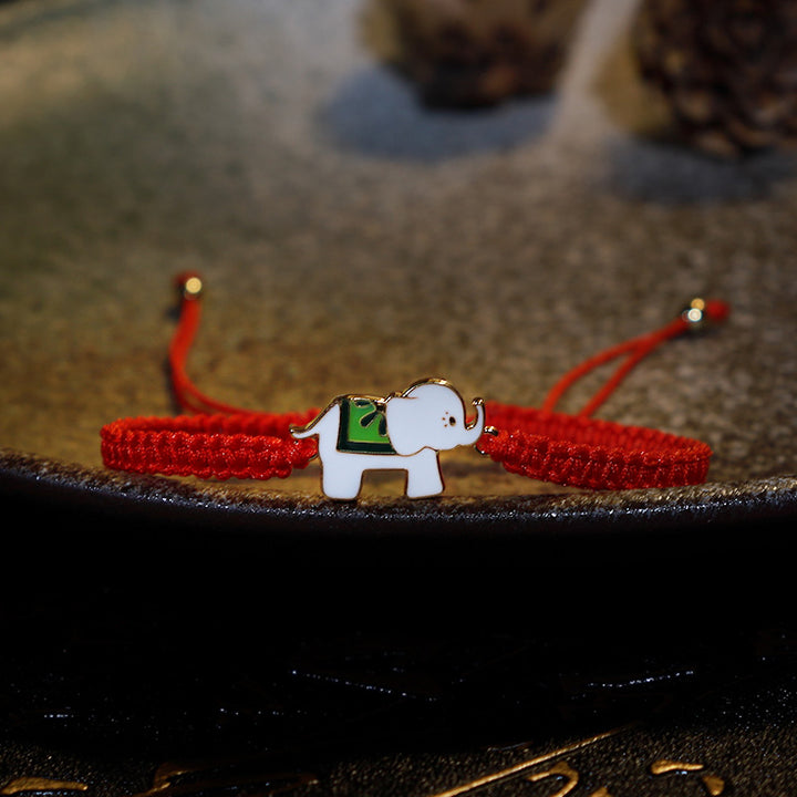 Bracelet tibétain en argent sterling 925 fait main avec des Buddha Stones et un éléphant porte-bonheur rouge